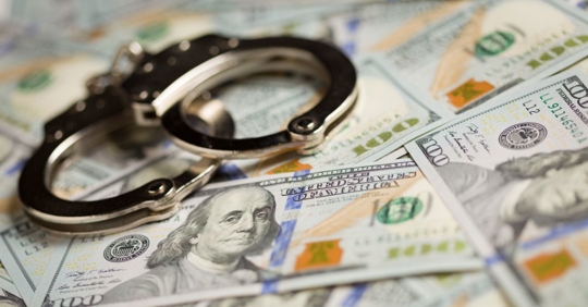 money and handcuffs