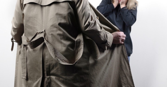 man in a trench coat exposing himself to a woman