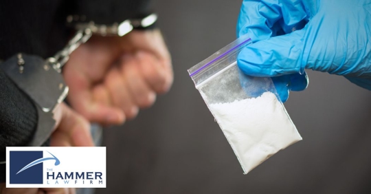 authorities arresting someone with drugs